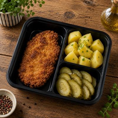 Vepřový řízek z krkovice, vařený brambor, okurka, 350g celá porce / 100g maso