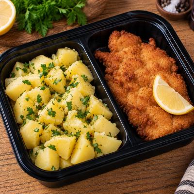 Vepřový řízek z kotlety, vařené brambory s máslem a petrželkou, citron (česká klasika jako od maminky), 350g celá porce/ 100g maso
